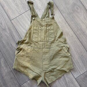 THE GREAT. Green Overall Shorts